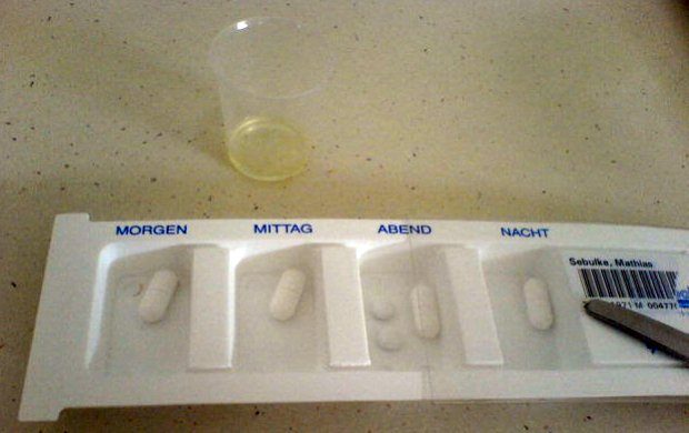 Seven-day pill organizer